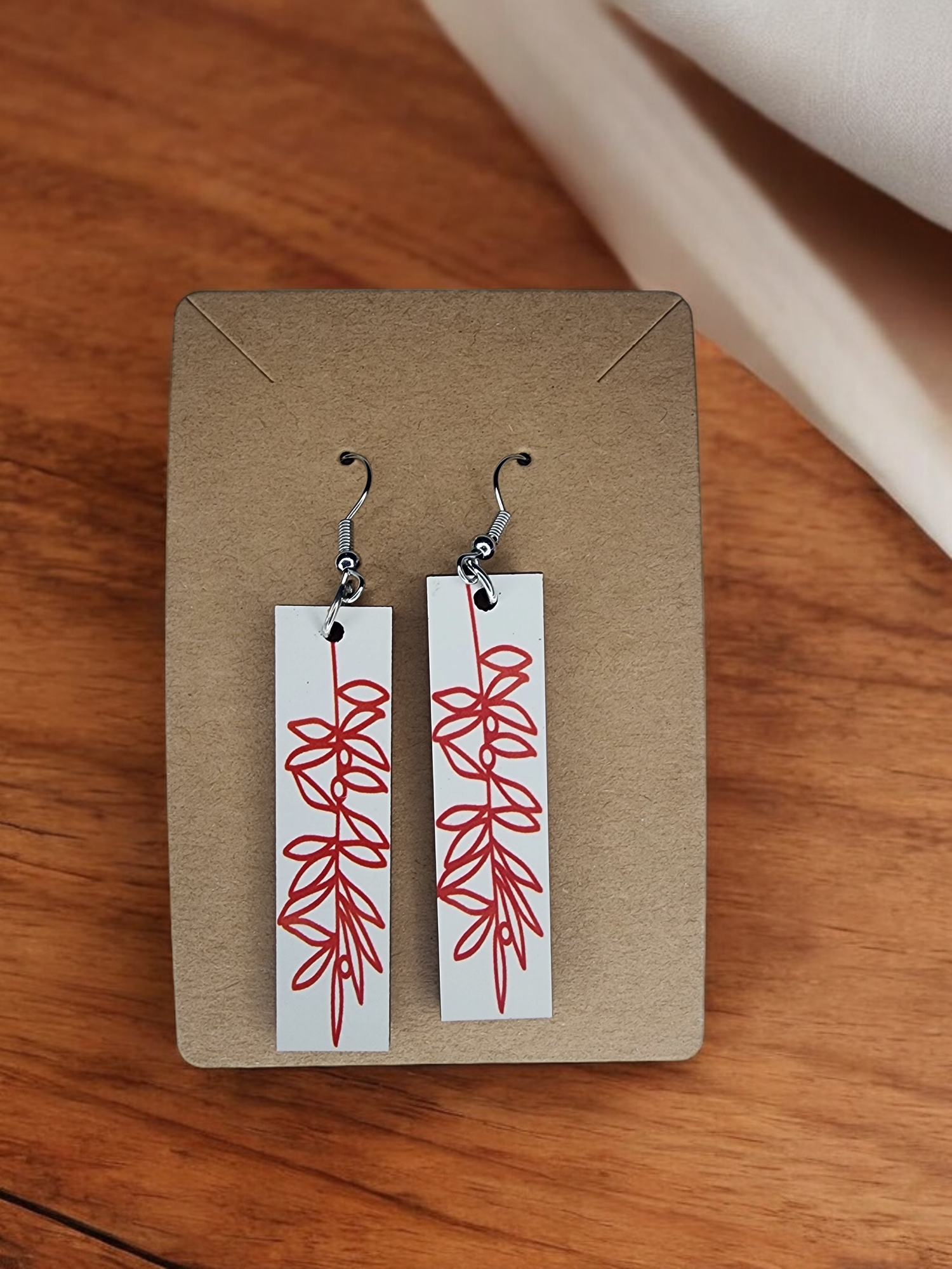 Handmade pre-made or custom earrings in bold shapes